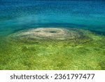 Fishing Cone Below The Clear Water of Yellowstone Lake in summer