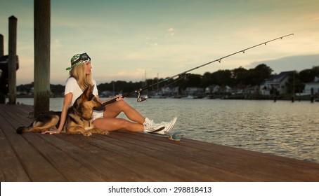 Fishing Of The Dock With A German Shepard 