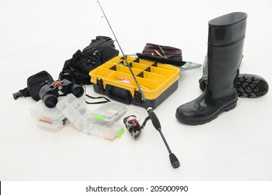 Fishing Equipment Box For Hooks And Flies Hat, Spinner, Waders And Binoculars. Isolated On White Background