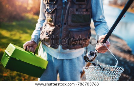 Fishing. Fisherman with fishing equipment. Sport, recreation concept Foto stock © 