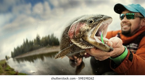 Fishing. Fisherman And Trout. Dramatic.