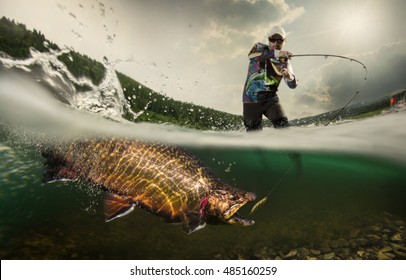 Fishing. Fisherman and trout, underwater view