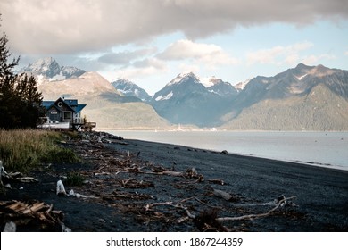 Fishing House With Boat And Beach In Seward, Kenai Peninsula Borough, Alaska.