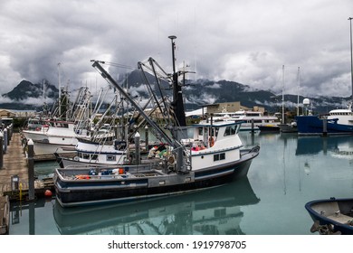 Fishing Industrial Trawler Ships Parked In Marina Pier In Valdez, Alaska