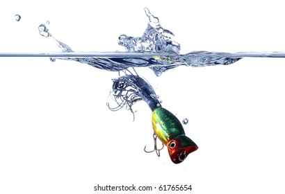 A Fishing Lure Splashing Down Into Water