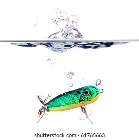 A Fishing Lure Splashing Down Into Water