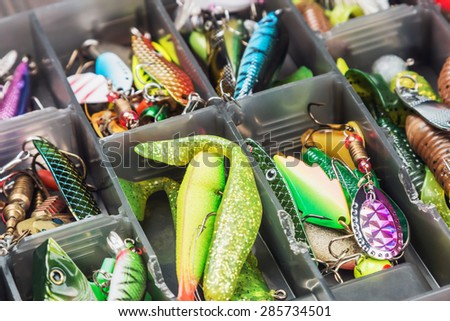 Box with lures lies on the fishing bag - Free Stock Photo by Ivan