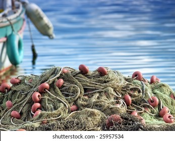 Fishing nets on the waterfront after fishing day. 
NOTE: This portfolio contains toned version of this image. - Powered by Shutterstock