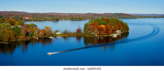 Fishing On Lake In Fall 