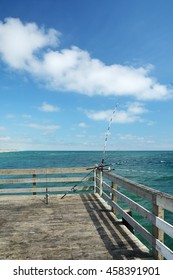 Fishing pier at beach of Kill Devil Hills, North Carolina USA in summer