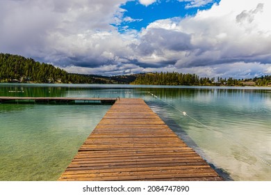 Fishing Pier Extending Onto Foys Lake, Kalispell, Montana, USA