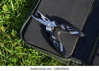 Fishing Pliers In The Tackle Case