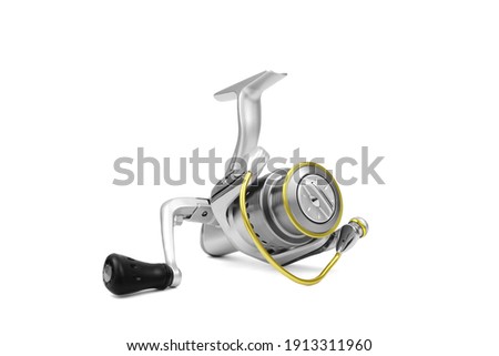 Fishing reel isolated on white background. Fishing supplies and equipment.