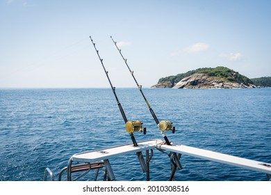 Fishing Reels And Rods Reels For Big Game Fishing Trolling Tuna.Big Trawler Fishing In The Hot Sea, Blue Sky And Blue Water.Andaman Sea Fishing, Phuket, Thailand. 