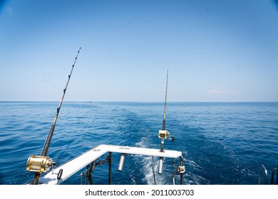 Fishing reels and rods reels for big game fishing trolling tuna.blue sky and blue water.Andaman sea fishing, Phuket, Thailand.Copy space and text Space.  - Powered by Shutterstock