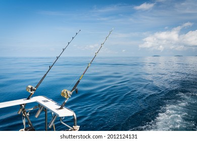 Fishing reels and rods reels .Fishing trolling tuna with speedboat on the pacific ocean. - Shutterstock ID 2012124131