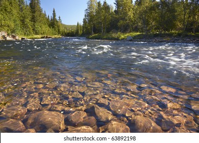 Fishing River In Mountains