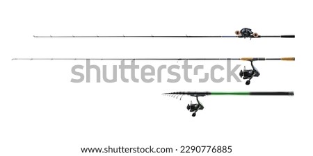 Fishing rods and reels on white background. 
