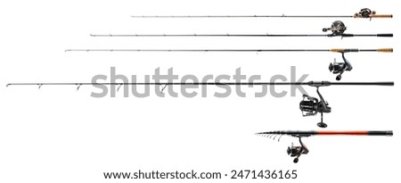 Fishing rods and reels on white background.