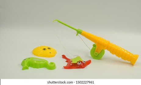 Fishing Set Toy For Kids. Colorful Fishing Rod Toy And Plastic Fishes For Kids Learning.