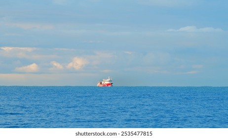 Fishing Ship In Open Sea Water. Beautiful Fishing Boat With The Blue Sea On Background. Static View. - Powered by Shutterstock