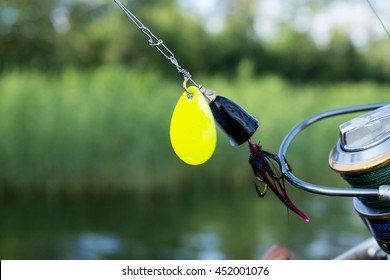 Fishing Spinnerbait On Fishing Reel At The Lake