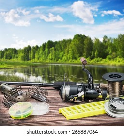 fishing tackle and accessories on the table summer day