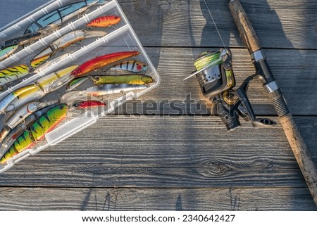 Box with lures lies on the fishing bag - Free Stock Photo by Ivan