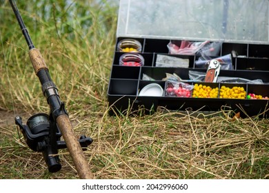 Fishing tackle on the river bank, bait rod, spinning rod, fish. Nature. Selective focus