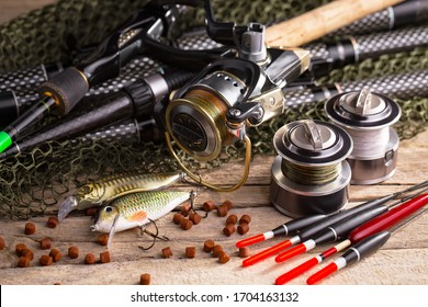 fishing tackle on a wooden table.