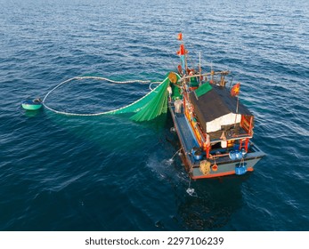 Fishing trawlers are fishing in the sea by huge net in Phu Yen, Vietnam