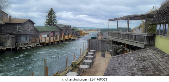 Fishing Village Along a Pier and Blue Waters on a Cloudy Day