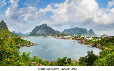 Fishing Village Reine (Lofoten, Norway). Summer Cloudy Panorama.