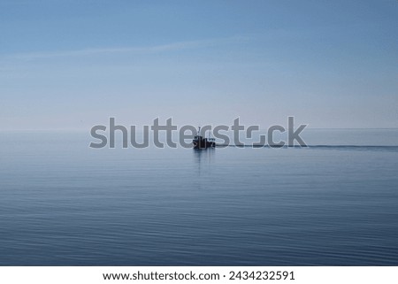 Fishingboat on its way out to the sea