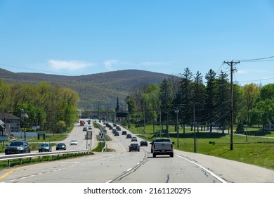 Fishkill, NY, USA-May 2022; Panoramic View Over The US Highway 9 Busy With Traffic On A Clear Day With Blue Sky With First Reformed Church Fishkill In Background