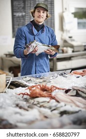 Fishmonger Selling Fish