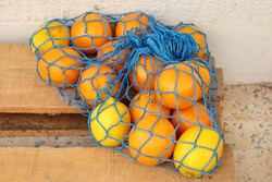 https://image.shutterstock.com/image-photo/fishnet-shopping-bag-filled-oranges-250nw-1712153590.jpg