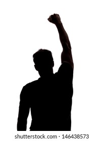 Fist In The Air In Silhouette Isolated Over White Background 