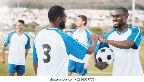 Fist bump, soccer team and fitness teamwork success of a sports group in training on a grass field. Football friends, support and exercise support with motivation outdoor for health workout and smile - Shutterstock ID 2256069775