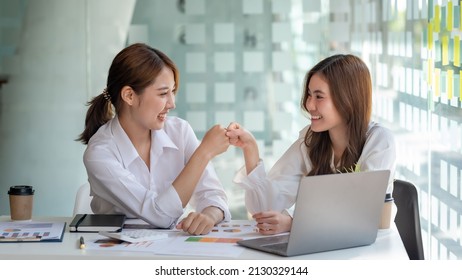 Fist Bump. Teamwork Of Successful Business People. Young Asian Businesswoman Or Intern Who Successfully Completes Her Goals.