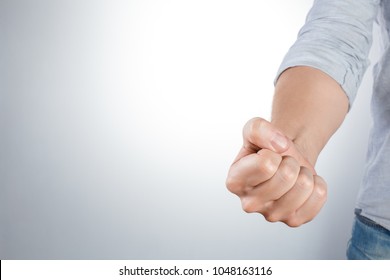 Fist Threatening Somebody Or Holding Something On White Background