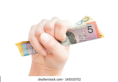 Fistful Of Cash - One Hand Clutching Australian Money Bank Notes In A Fist And Isolated On White