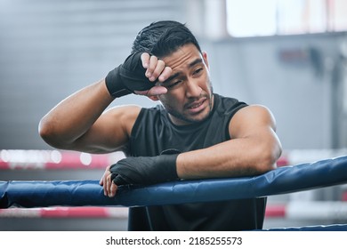 Fit, Active Or Healthy Boxing Man Feeling Tired, Hot And Wiping Sweat After Workout, Training Or Exercise In Ring. Sporty, Athletic Or Strong Boxer Upset After Losing Kickboxing Fight Or Sports