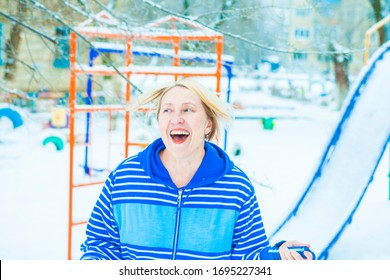 Fit Active Old Blond Woman Performing Training And Doing Her Warming Up Exercise With Jumping Rope Outdoors Snowy Winter