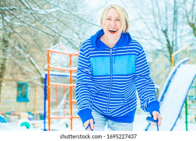 Fit Active Old Blond Woman Performing Training And Doing Her Warming Up Exercise With Jumping Rope Outdoors Snowy Winter