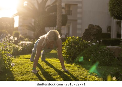 fit athlete woman making stretching exercises open air tropical yard villa swimming pool, Early morning Hotel resort vacation, Health care, wellbeing
