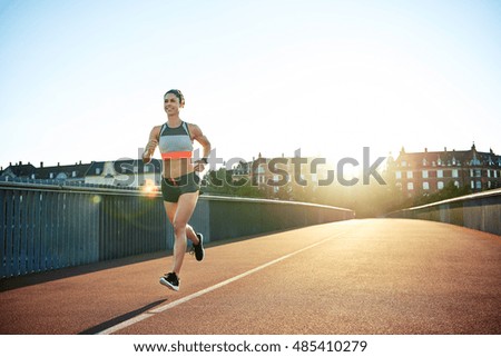 Similar – Image, Stock Photo runner running across the field with his dog