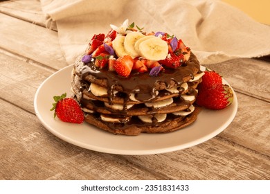 Fit Banana Pancake Stack with Strawberry and Hazelnut Cream, horizontal crop