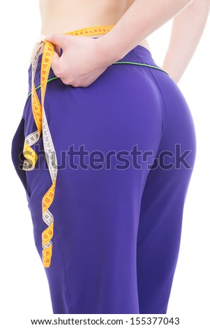 Fit female buttocks in purple pants