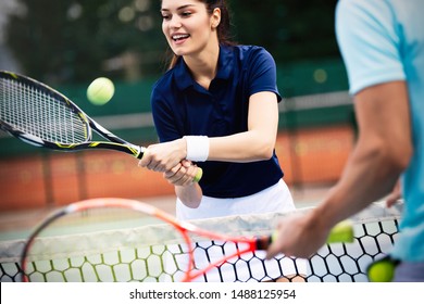 Fit Happy Poeple Playing Tennis Together. Sport Concept